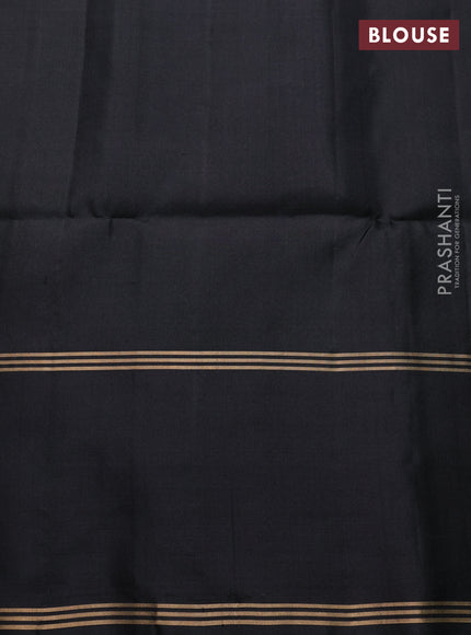 Pure soft silk saree light green and black with zari woven buttas and rettapet zari woven border
