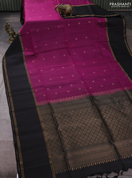 Pure soft silk saree magenta pink and black with allover zari woven buttas and rettapet zari woven border