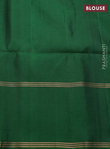 Pure soft silk saree green with allover zari woven buttas and long rettapet zari woven border