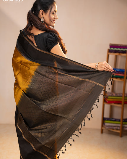 Pure soft silk saree dark mustard and black with zari woven buttas and rettapet zari woven border