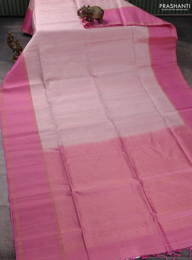 Pure soft silk saree pastel pink and peach pink with allover zari woven buttas and long rettapet zari woven border