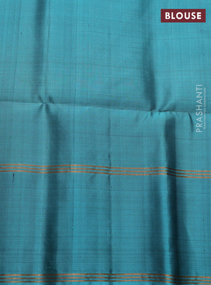 Pure soft silk saree violet and teal green with allover zari woven buttas and long rettapet zari woven border