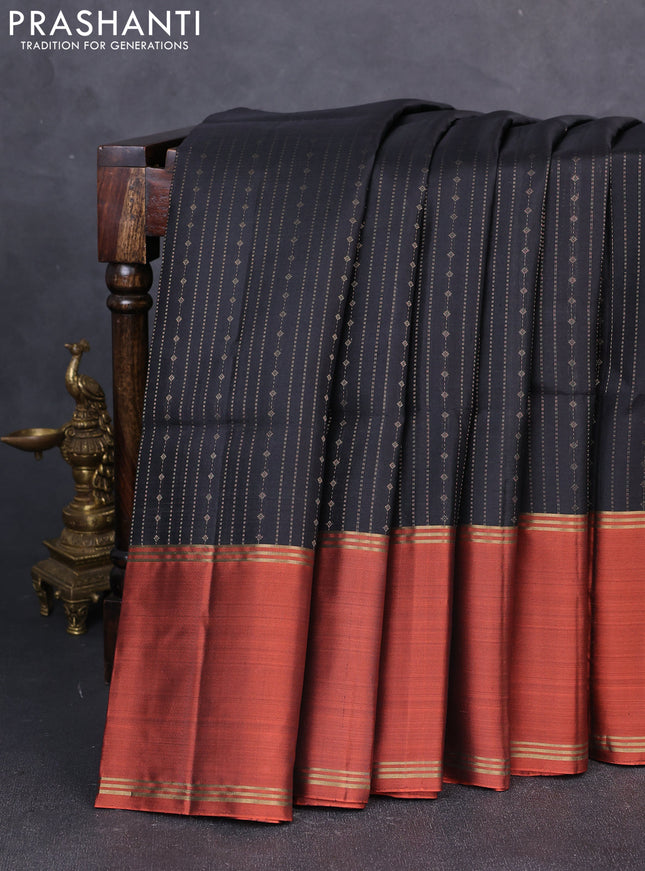 Pure soft silk saree black and orange with allover zari weaves  and long rettapet zari woven border