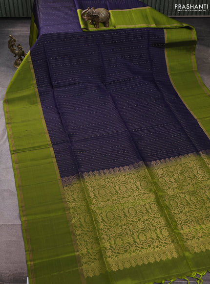 Pure soft silk saree navy blue and light green with allover zari weaves  and long rettapet zari woven border