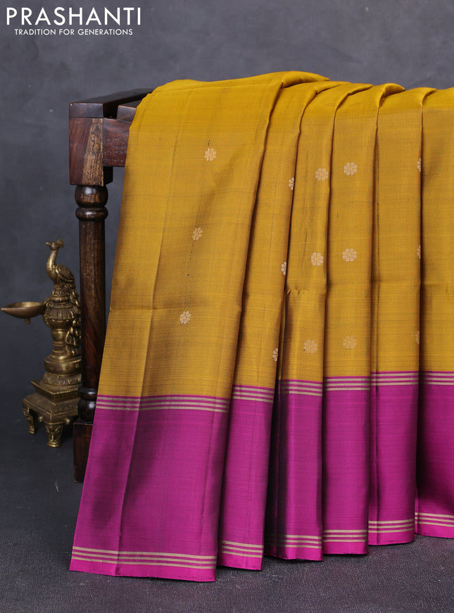 Pure soft silk saree dark mustard and magenta pink with allover zari woven buttas and long rettapet zari woven border
