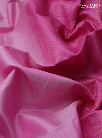 Pure soft silk saree peach pink with allover zari woven buttas and rettapet zari woven border