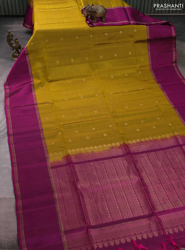 Pure soft silk saree mustard green and magenta pink with allover zari woven buttas and long rettapet zari woven border