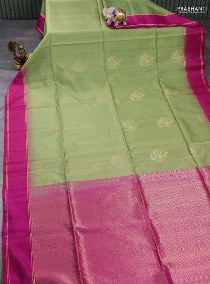 Pure soft silk saree pista green and magenta pink with zari woven buttas and rettapet zari woven border