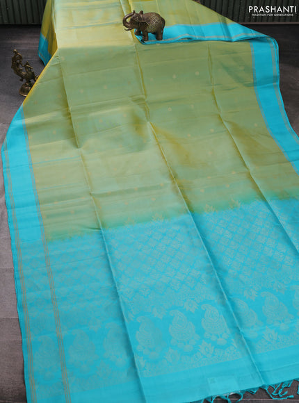 Pure soft silk saree dual shade of bluish yellow and teal blue with zari woven buttas and rettapet zari woven border