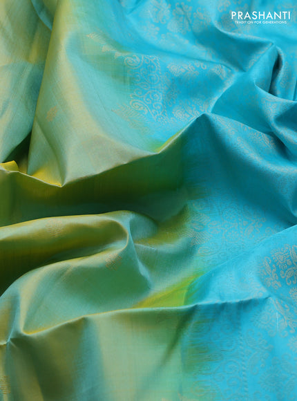 Pure soft silk saree dual shade of bluish yellow and teal blue with zari woven buttas and rettapet zari woven border