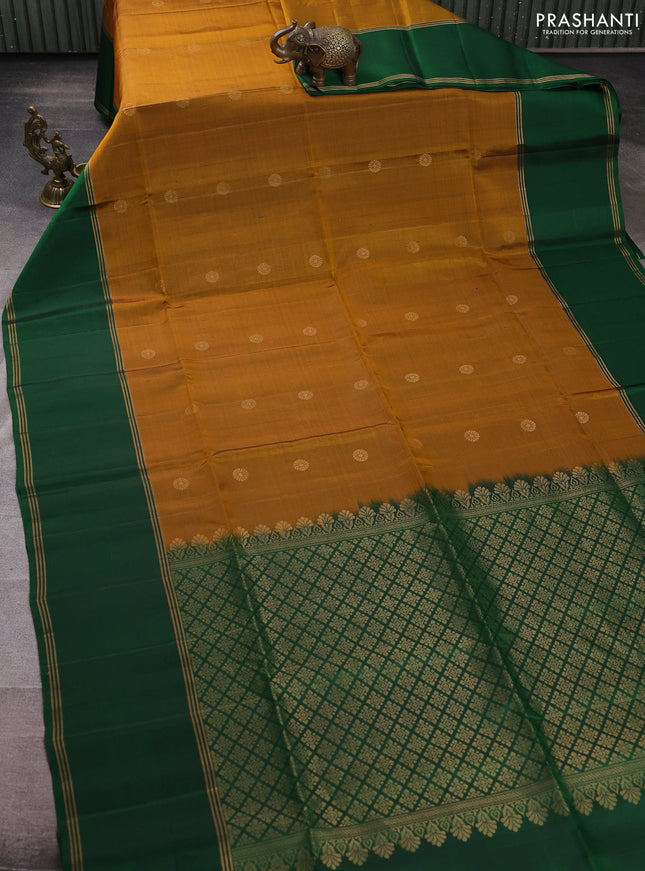 Pure soft silk saree dark mustard and green with zari woven buttas and rettapet zari woven border