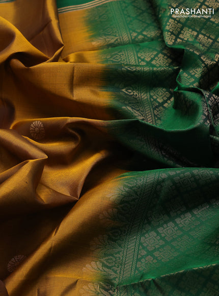 Pure soft silk saree dark mustard and green with zari woven buttas and rettapet zari woven border
