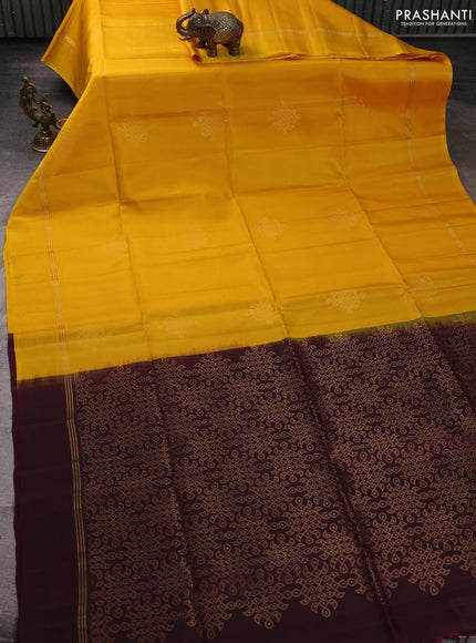 Pure soft silk saree yellow and deep maroon with zari woven buttas and zari woven simple border