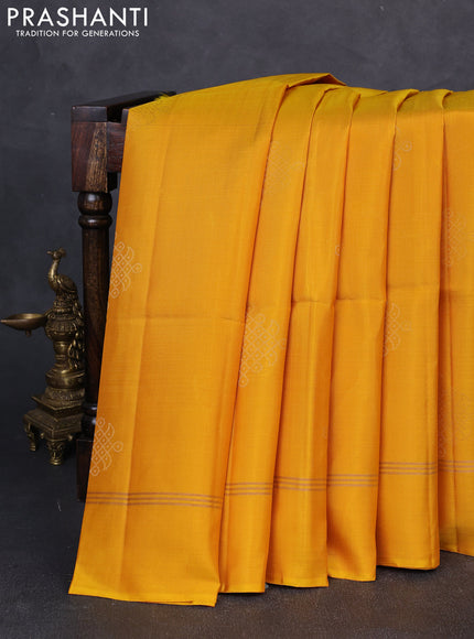 Pure soft silk saree yellow with zari woven buttas and zari woven simple border