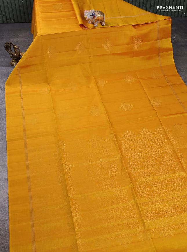 Pure soft silk saree yellow with zari woven buttas and zari woven simple border