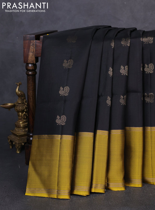Pure soft silk saree black and yellow with allover annam zari woven buttas and rettapet zari woven border