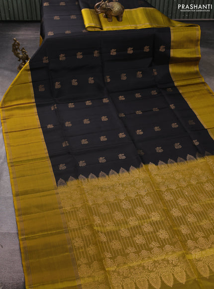 Pure soft silk saree black and yellow with allover annam zari woven buttas and rettapet zari woven border