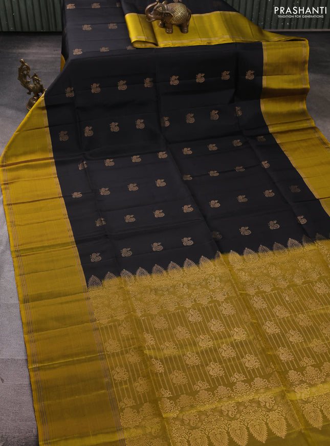 Pure soft silk saree black and yellow with allover annam zari woven buttas and rettapet zari woven border