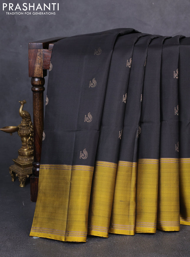Pure soft silk saree black and mustard green with zari woven buttas and rettapet zari woven border