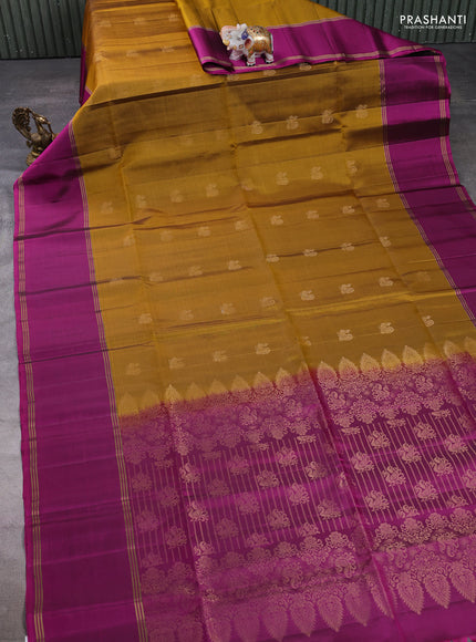 Pure soft silk saree dark mustard and magenta pink with allover annam zari woven buttas and rettapet zari woven border