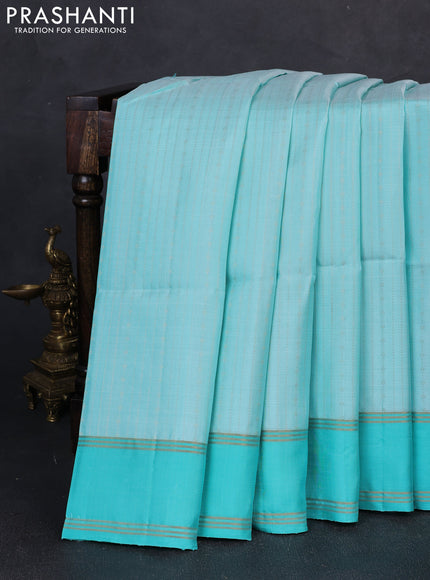 Pure soft silk saree teal green with allover zari weaves  and rettapet zari woven border