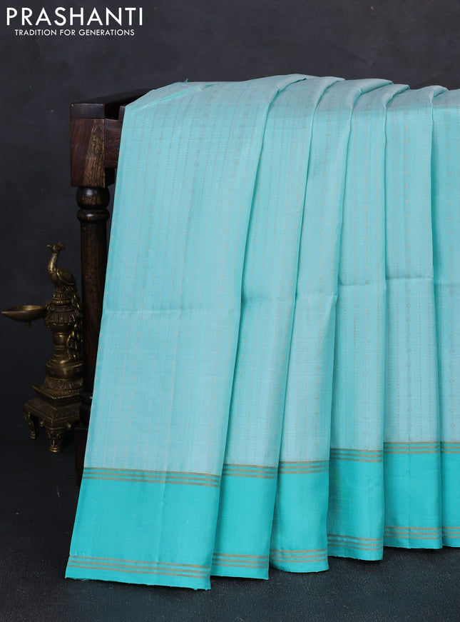Pure soft silk saree teal green with allover zari weaves  and rettapet zari woven border