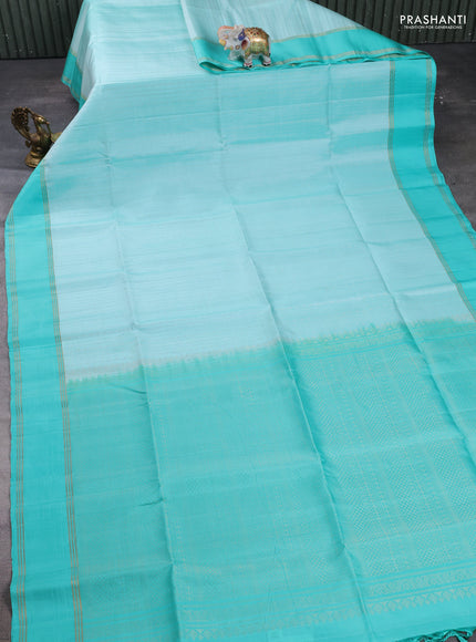 Pure soft silk saree teal green with allover zari weaves  and rettapet zari woven border