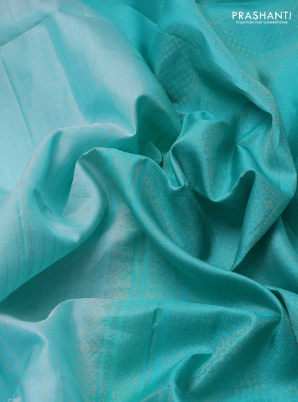 Pure soft silk saree teal green with allover zari weaves  and rettapet zari woven border