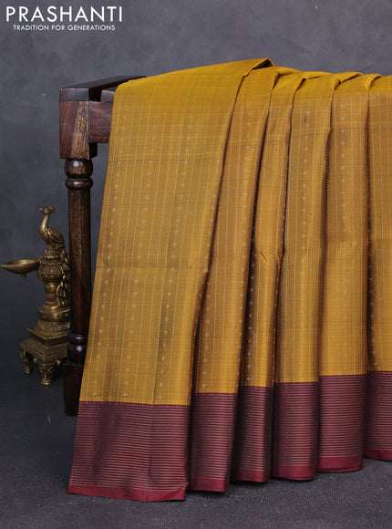Pure soft silk saree dark mustard and deep maroon with allover zari weaves  and rettapet zari woven border
