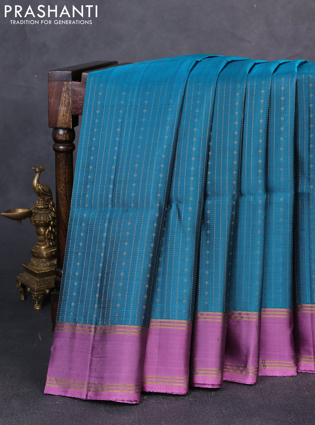 Pure soft silk saree peacock green and mauve pink with allover zari weaves  and rettapet zari woven border