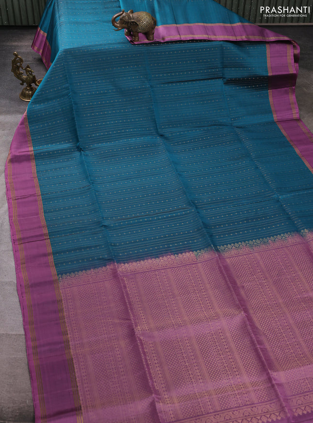 Pure soft silk saree peacock green and mauve pink with allover zari weaves  and rettapet zari woven border