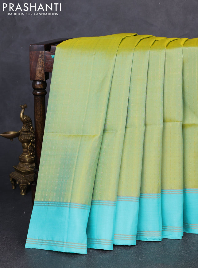 Pure soft silk saree dual shade of pista green and teal green with allover zari weaves and zari woven border