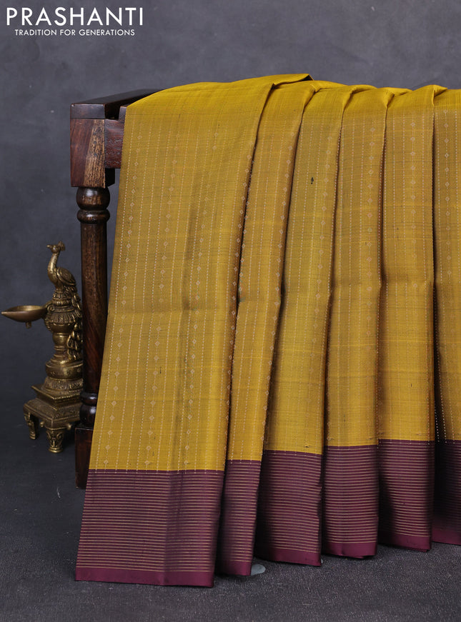 Pure soft silk saree mustard green and deep wine shade with allover zari weaves and zari woven border