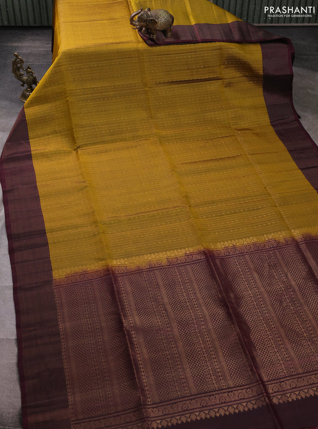 Pure soft silk saree mustard green and deep wine shade with allover zari weaves and zari woven border