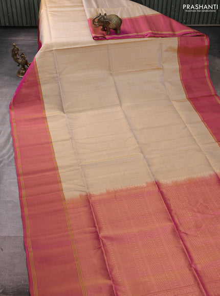 Pure soft silk saree beige and pink with allover zari weaves and rettapet zari woven border