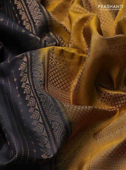 Pure soft silk saree black and dark mustard with allover zari weaves and long rettapet zari woven border