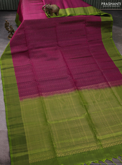 Pure soft silk saree magenta pink and light green with allover zari weaves and zari woven border