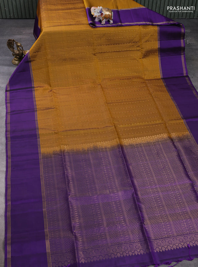Pure soft silk saree dark mustard and violet with allover zari weaves and long rettapet zari woven border