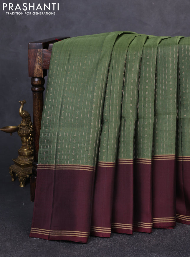 Pure soft silk saree olive green and deep maroon with allover zari weaves and long rettapet zari woven border