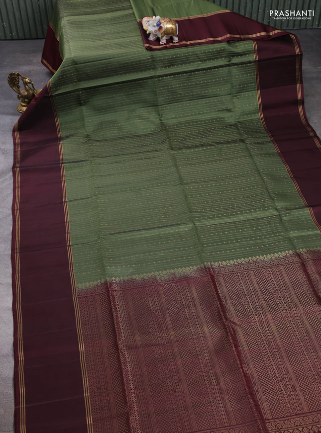 Pure soft silk saree olive green and deep maroon with allover zari weaves and long rettapet zari woven border