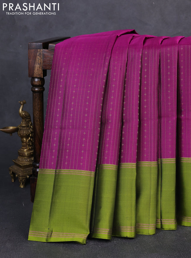 Pure soft silk saree purple and light green with allover zari weaves and long rettapet zari woven border