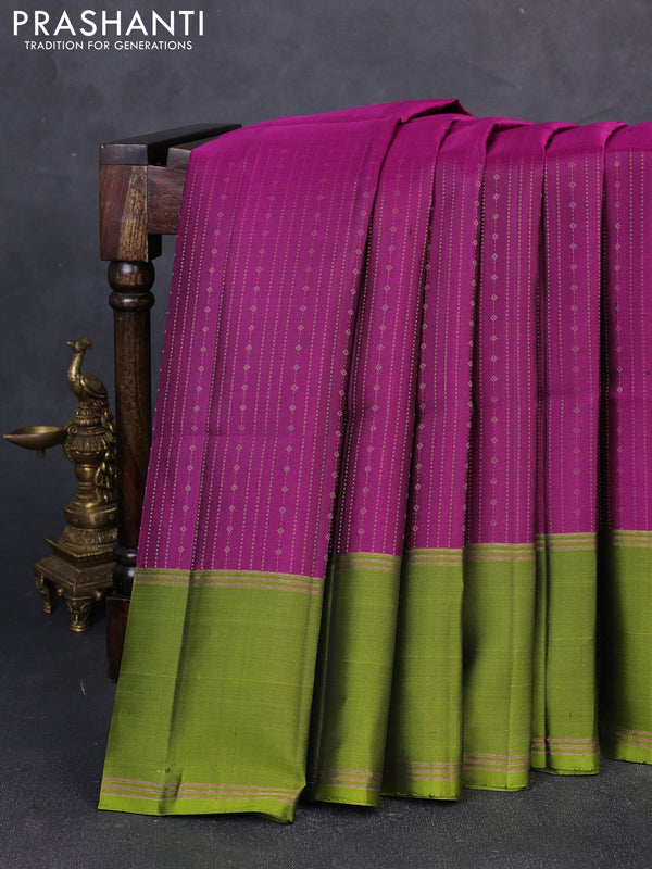 Pure soft silk saree purple and light green with allover zari weaves and long rettapet zari woven border