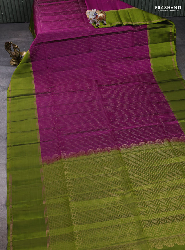 Pure soft silk saree purple and light green with allover zari weaves and long rettapet zari woven border