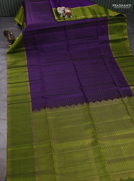 Pure soft silk saree violet and light green with allover zari weaves and long rettapet zari woven border