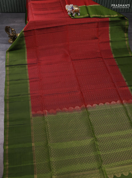 Pure soft silk saree rust shade and mehendi green with allover zari weaves and long rettapet zari woven border