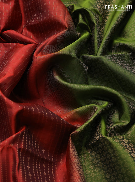 Pure soft silk saree rust shade and mehendi green with allover zari weaves and long rettapet zari woven border