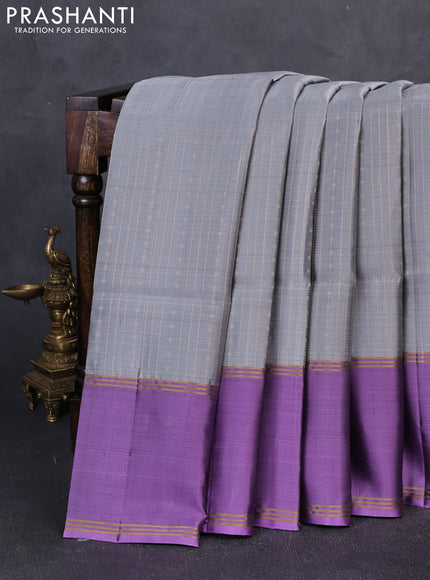 Pure soft silk saree grey and lavender with allover zari weaves and long rettapet zari woven border
