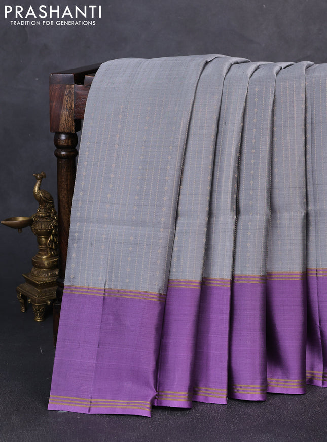 Pure soft silk saree grey and lavender with allover zari weaves and long rettapet zari woven border