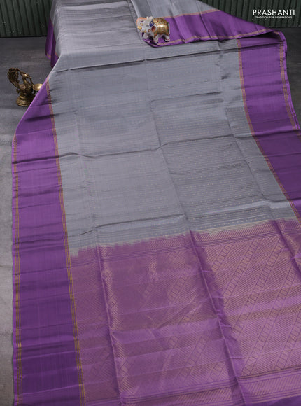 Pure soft silk saree grey and lavender with allover zari weaves and long rettapet zari woven border