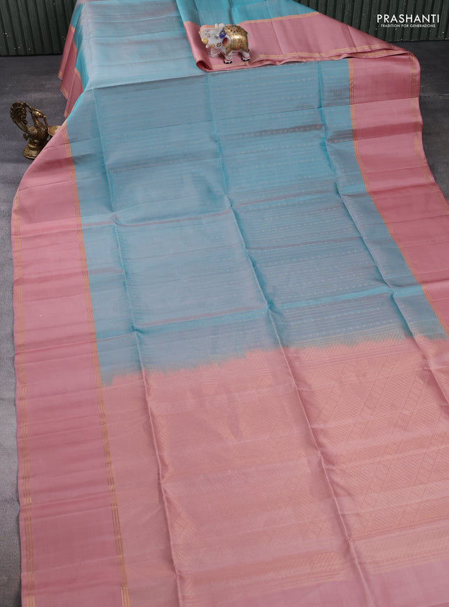 Pure soft silk saree teal blue and peach shade with allover zari weaves and long rettapet zari woven border